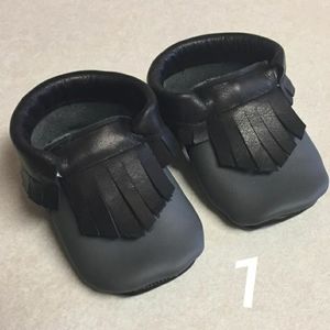Gray and black baby moccasins